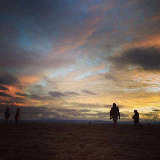 Sunset football at the beach